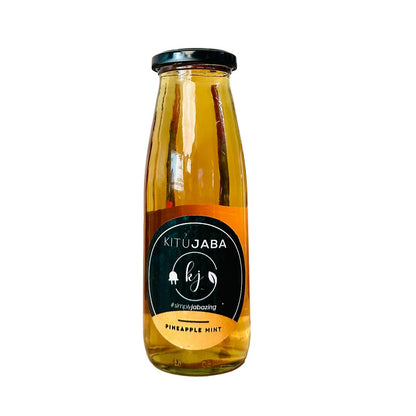 Bottle of Kitujaba Pineapple Mint juice on a white background